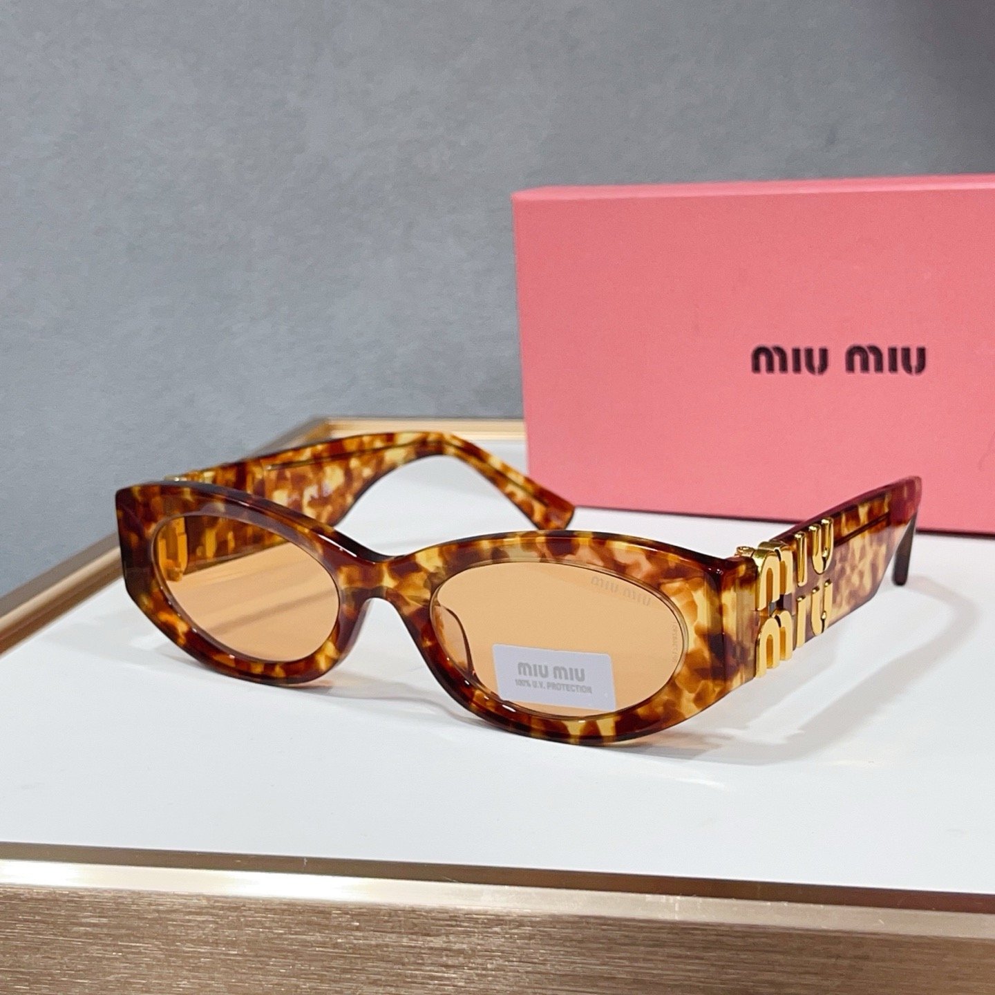 2474e59f MIU MIU SMU 11W Sunglasses - Image 1