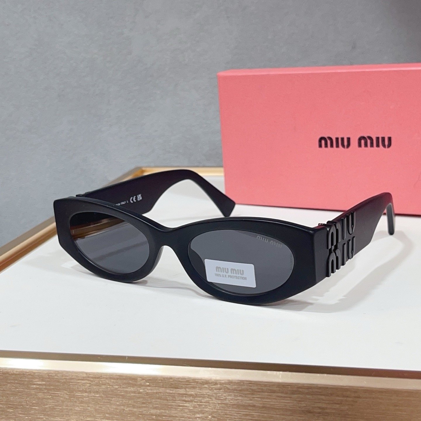 3463a8c9 MIU MIU SMU 11W Sunglasses - Image 1