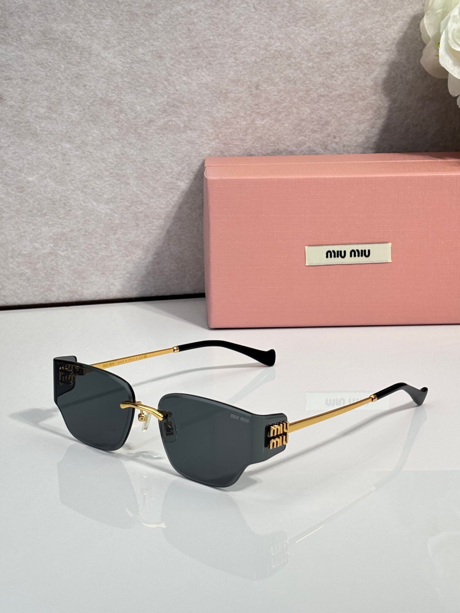 430f510a MIU MIU MU 176AV Sunglasses - Image 1