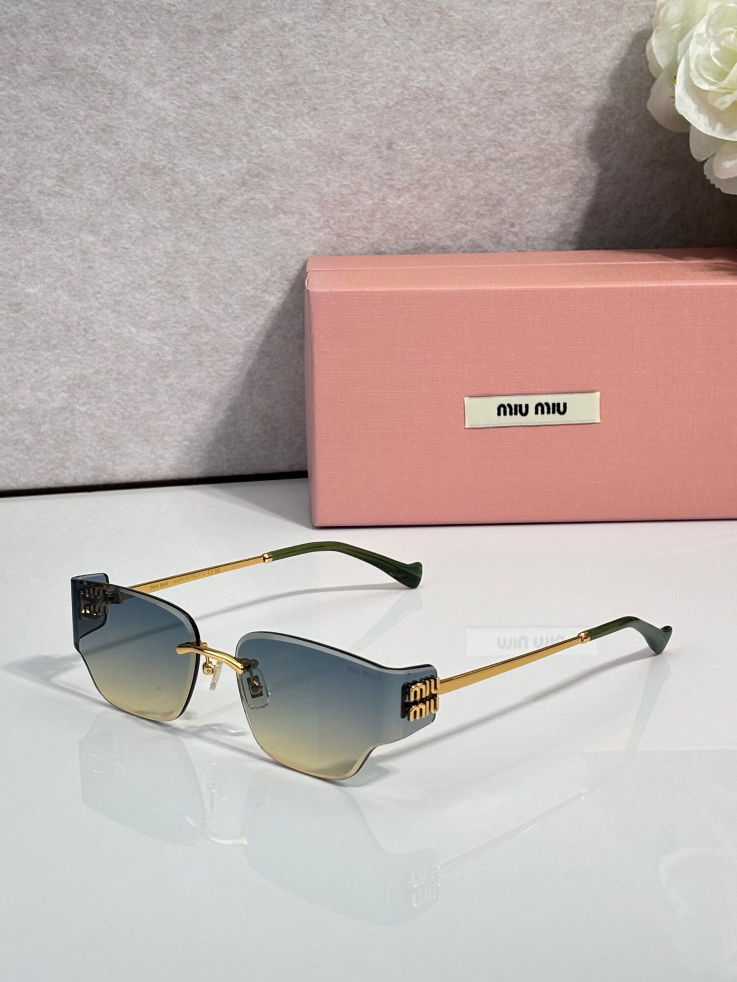 b3b1f344 MIU MIU MU 176AV Sunglasses - Image 1