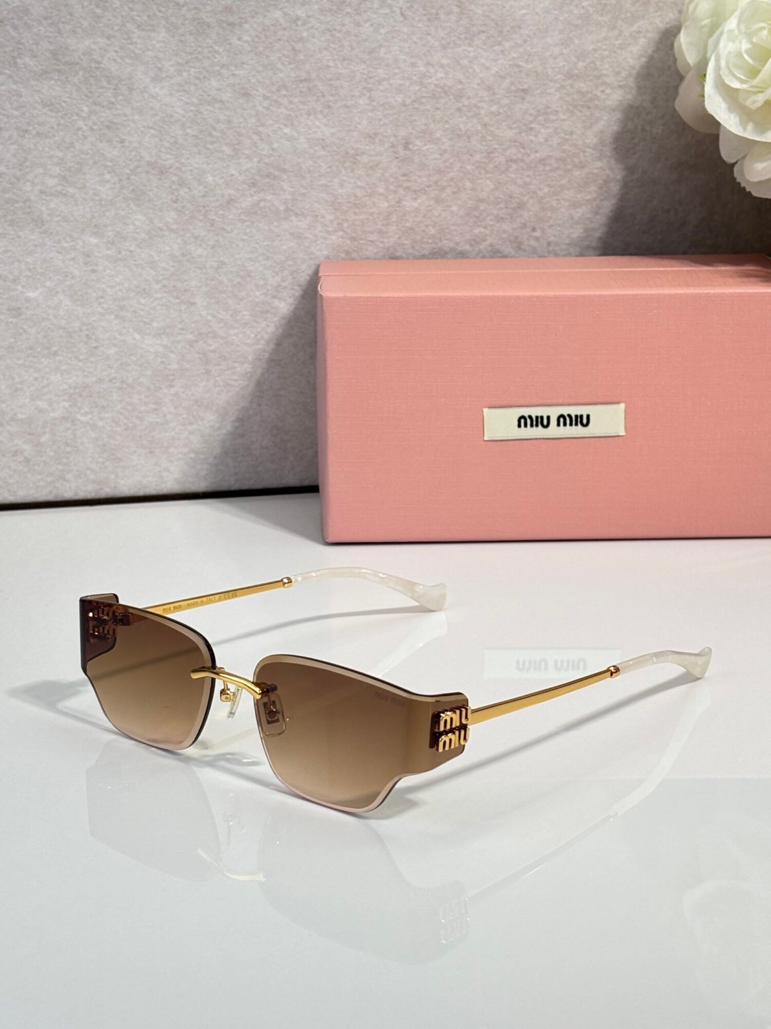 bb9ed32c MIU MIU MU 176AV Sunglasses - Image 1